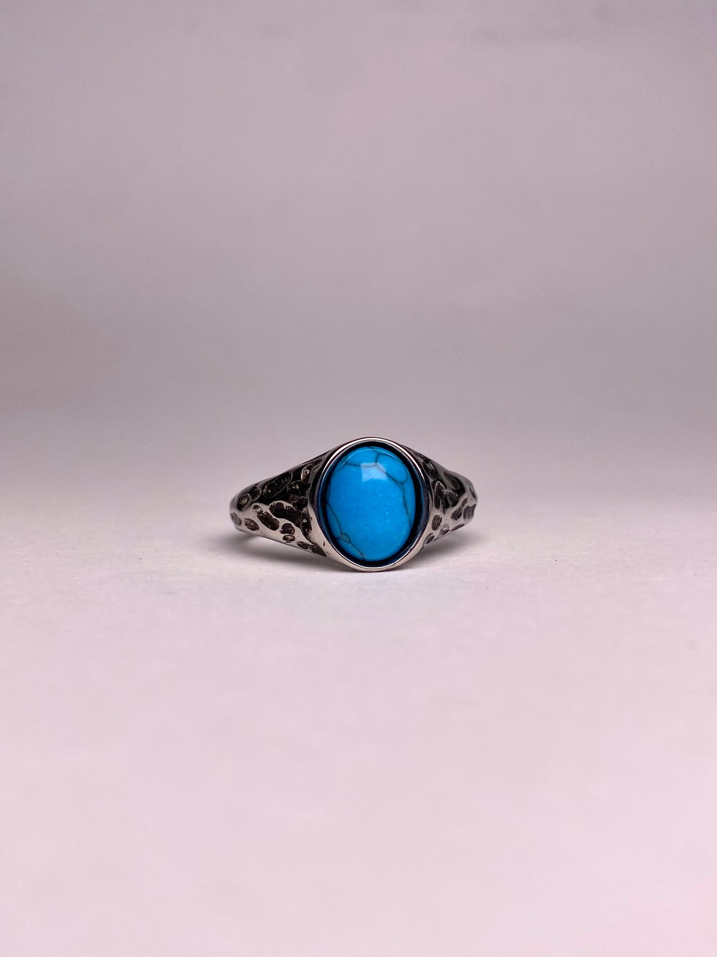 Front view of a high-quality 316L stainless steel ring with a natural blue Feroza stone, ideal for men’s gift items.