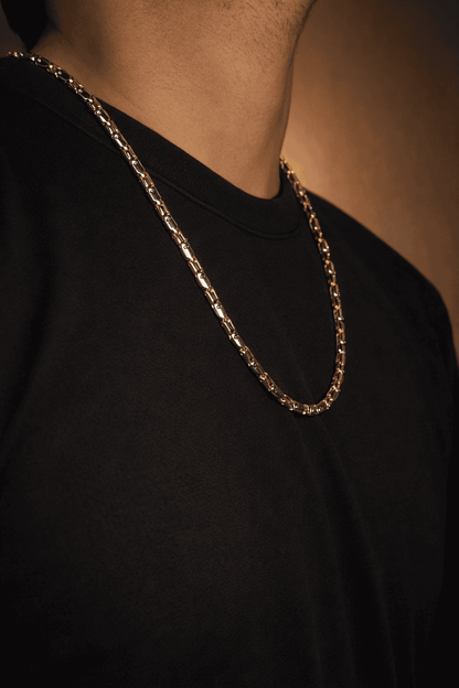 Gold and silver stainless steel biker link chain necklace for men in Pakistan, bold two tone heavy chain worn with black shirt, premium masculine jewelry
