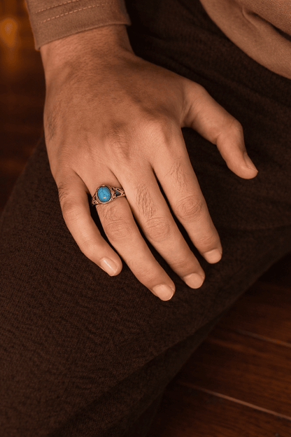 A man wearing a durable stainless steel Feroza ring that is rust-proof and perfect for daily wear in Pakistan.