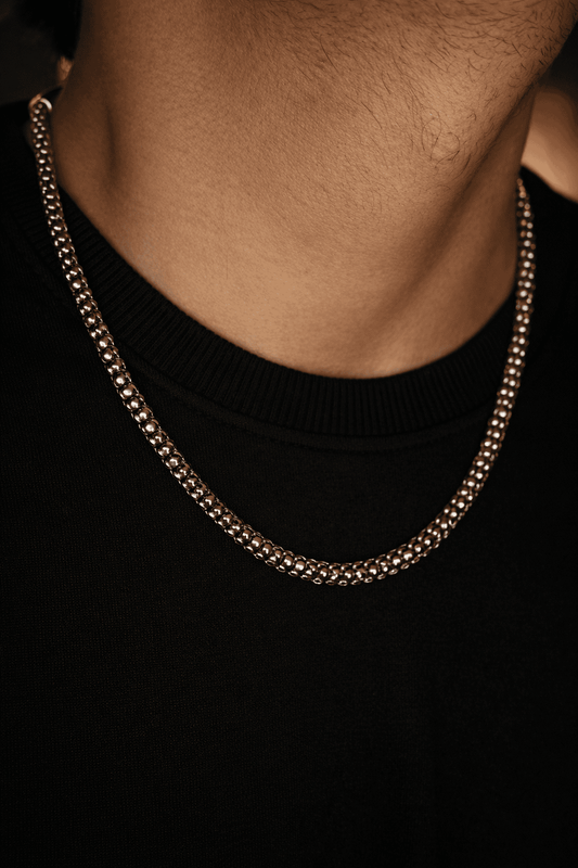 Men stainless steel popcorn chain necklace in Pakistan, polished silver round link chain worn with black shirt, durable waterproof everyday men jewelry