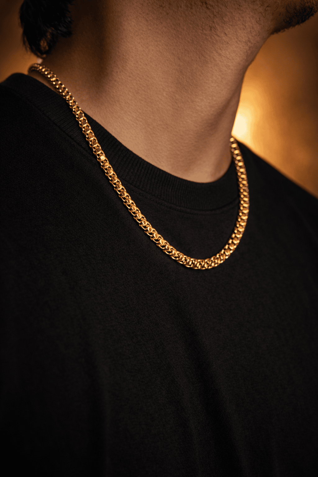 Roblox Chain Golden 316L stainless steel gold necklace worn by male model on black tshirt
