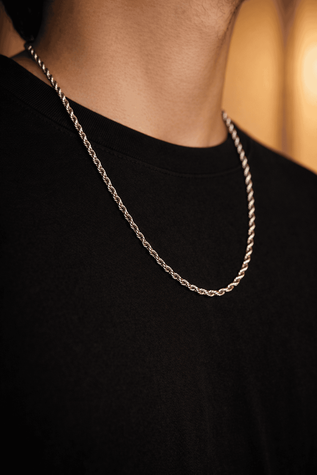 Men stainless steel rope chain necklace in Pakistan, thick silver twisted rope chain worn with black shirt, waterproof anti rust durable everyday men jewelry