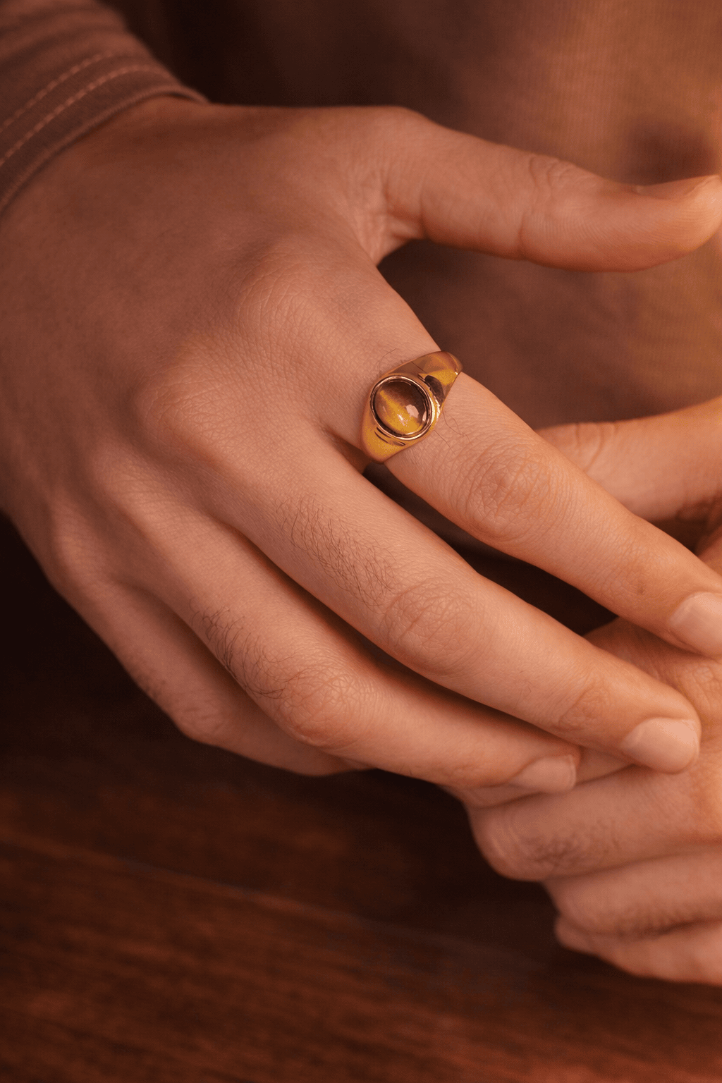 Men’s tiger eye gold ring worn on hand, premium stainless steel signet ring for men in Pakistan, stylish brown stone ring for everyday wear 