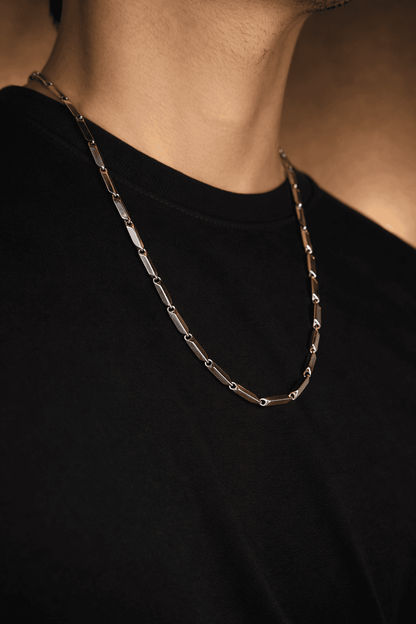 Men stainless steel Tricon chain necklace in Pakistan, polished silver modern chain worn with black shirt durable waterproof men jewelry