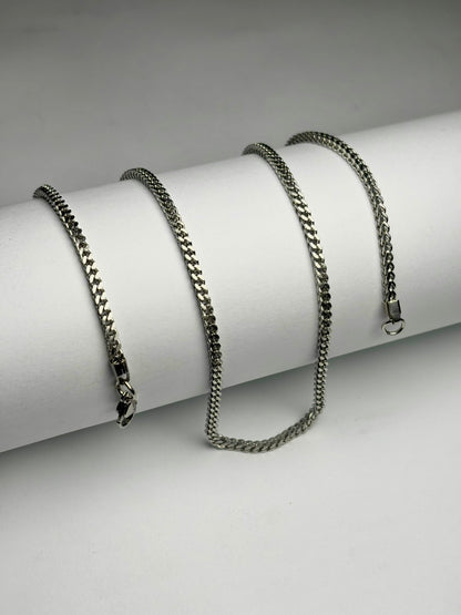 Stainless steel foxtail chain necklace for men Pakistan, polished silver foxtail link chain with lobster clasp on white background