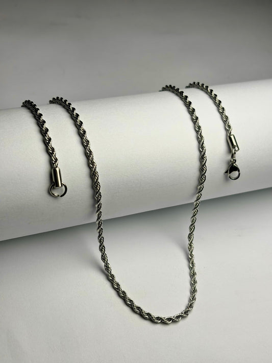 Silver stainless steel rope chain necklace for men Pakistan, thick twisted rope link chain with lobster clasp on white background