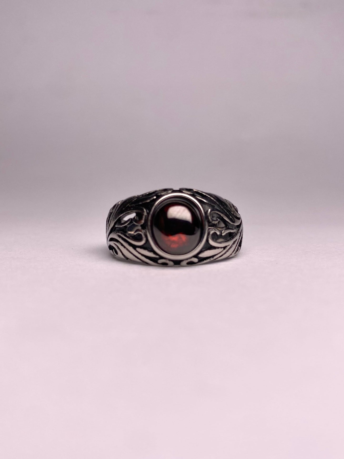 Front view of a high-quality red Garnet ring for men, made with rust-proof 316L stainless steel for daily wear.