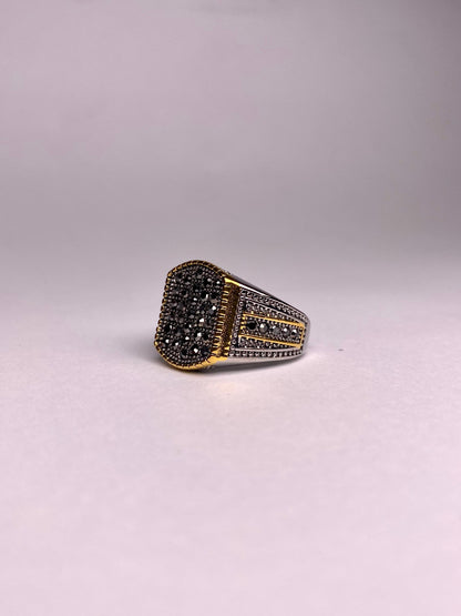 A close-up of the side profile of a Turkish men's ring featuring traditional Ottoman patterns on a high-quality, non-tarnish bronze-gold steel band.