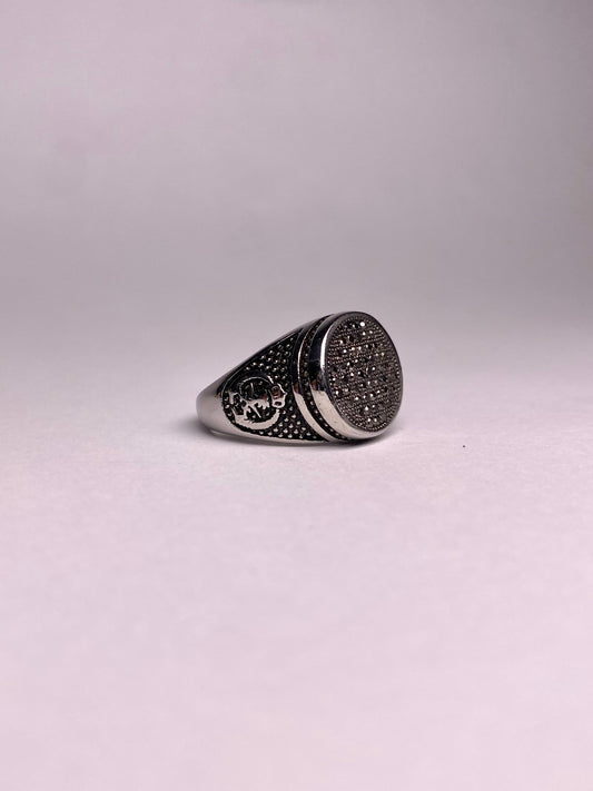 Side view of a Turkish ring showing the detailed crescent moon and star style engravings on a durable, rust-proof stainless steel band.
