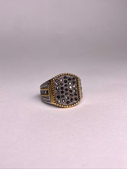 Front view of a premium square-cut black zircon stone set in a gold-plated stainless steel Turkish ring for men.