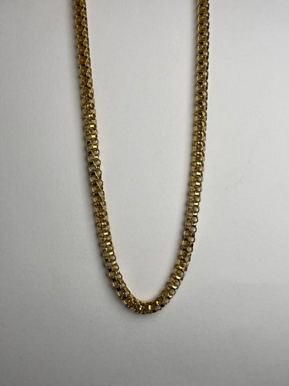 Roblox golden chain necklace flat lay showing detailed link pattern stainless steel
