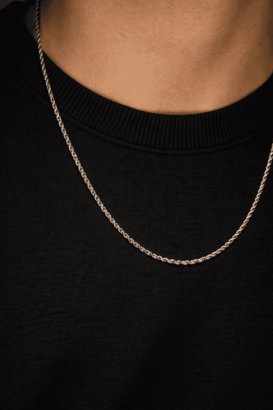 Men stainless steel rope chain necklace in Pakistan, thin polished silver rope link chain worn with black shirt, durable waterproof everyday men jewelry